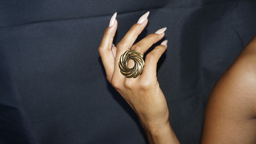 Bague dorée ajustable tressée en spirale