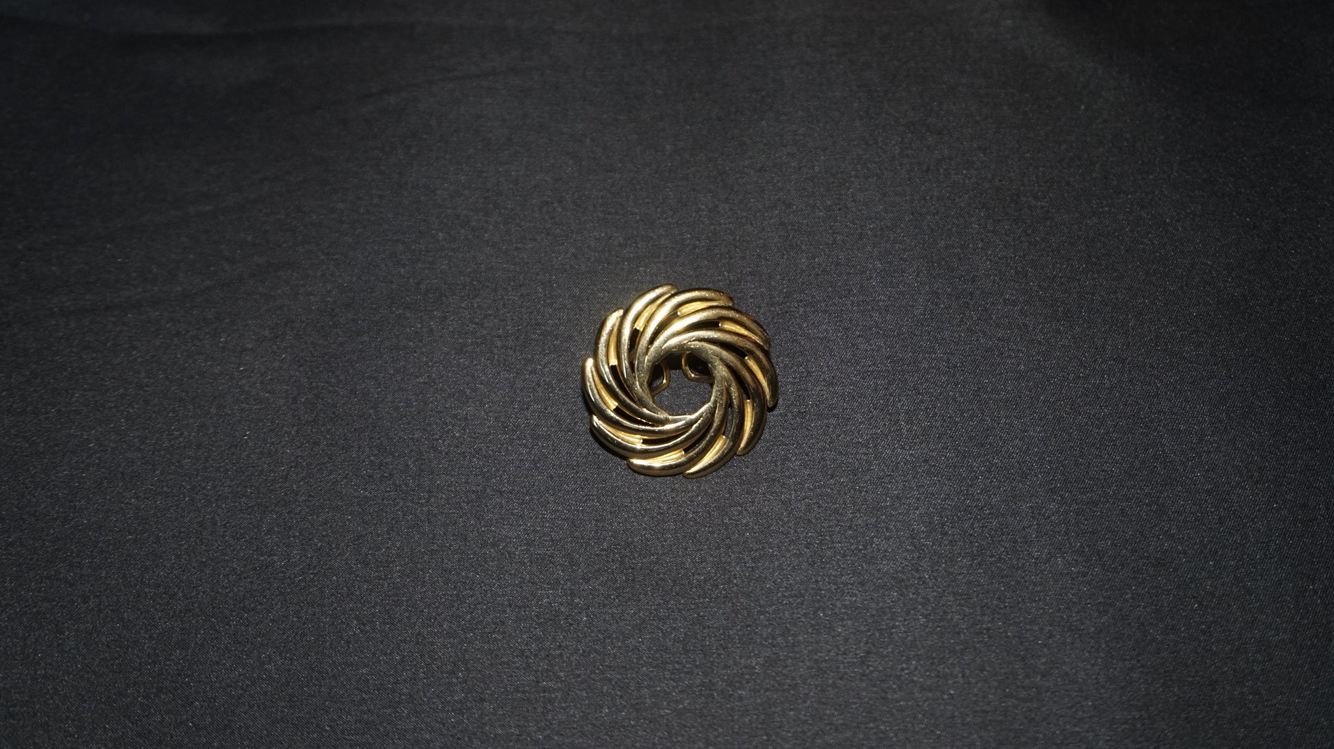Bague dorée ajustable tressée en spirale