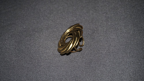 Bague dorée ajustable tressée en spirale